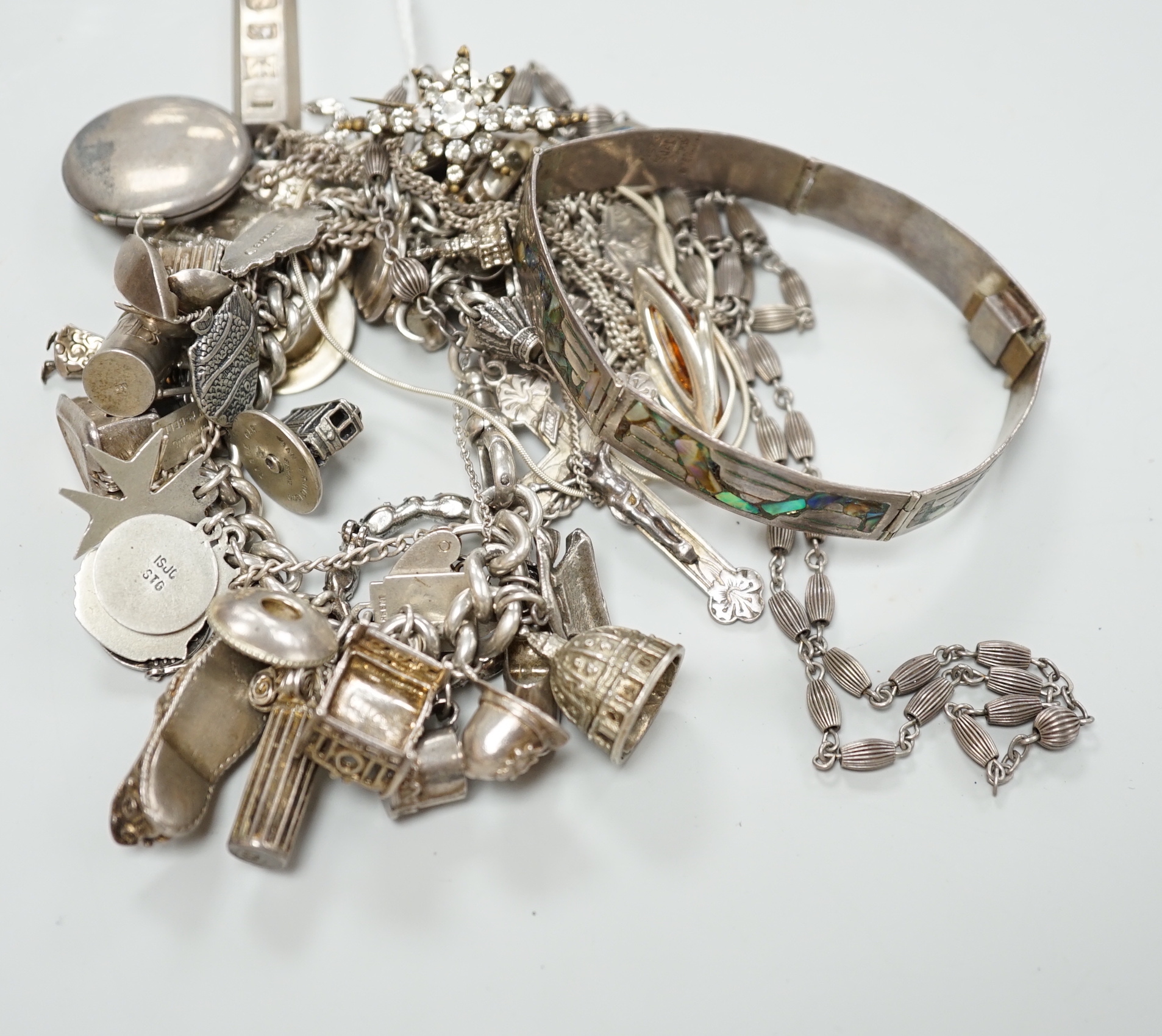 A silver charm bracelet and a small quantity of other silver and white metal jewellery.